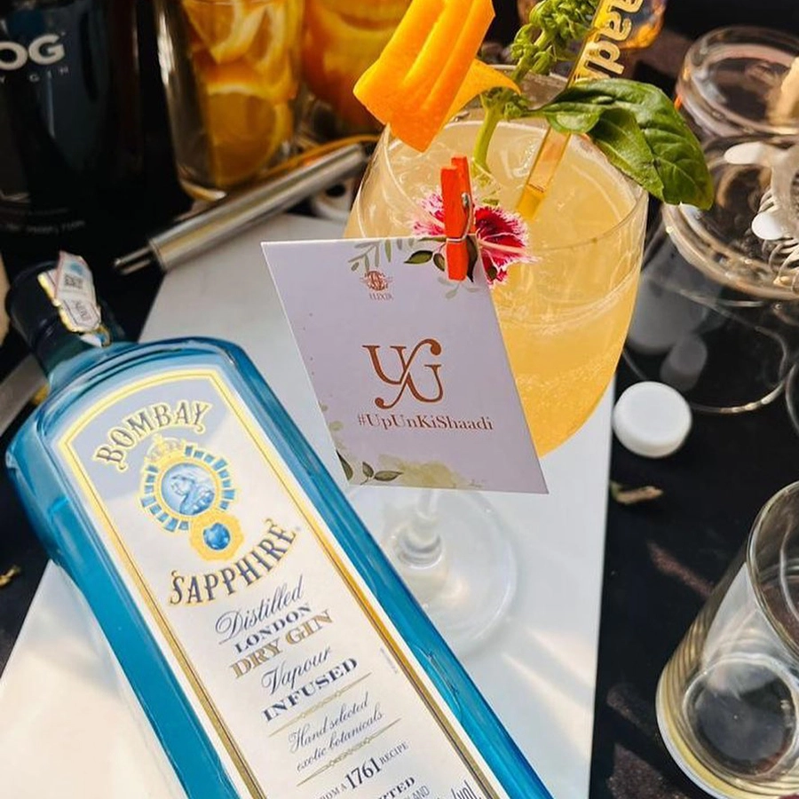 Signature cocktail with hashtag name for Goa wedding bar setup