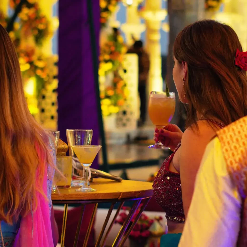 Guests enjoying cocktails at Goa wedding