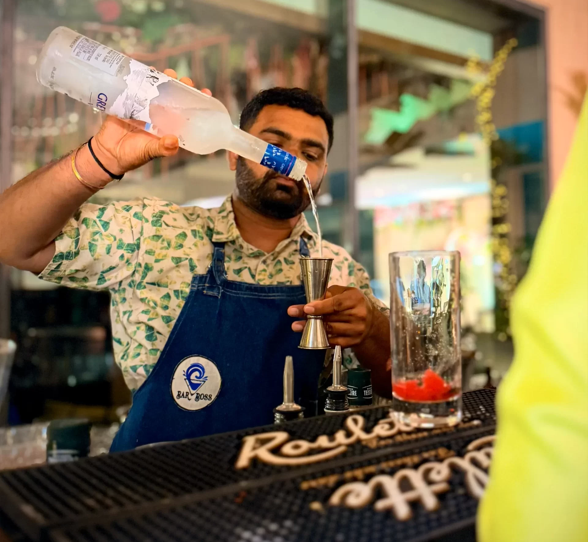 Flair bartender performing at a wedding in Goa