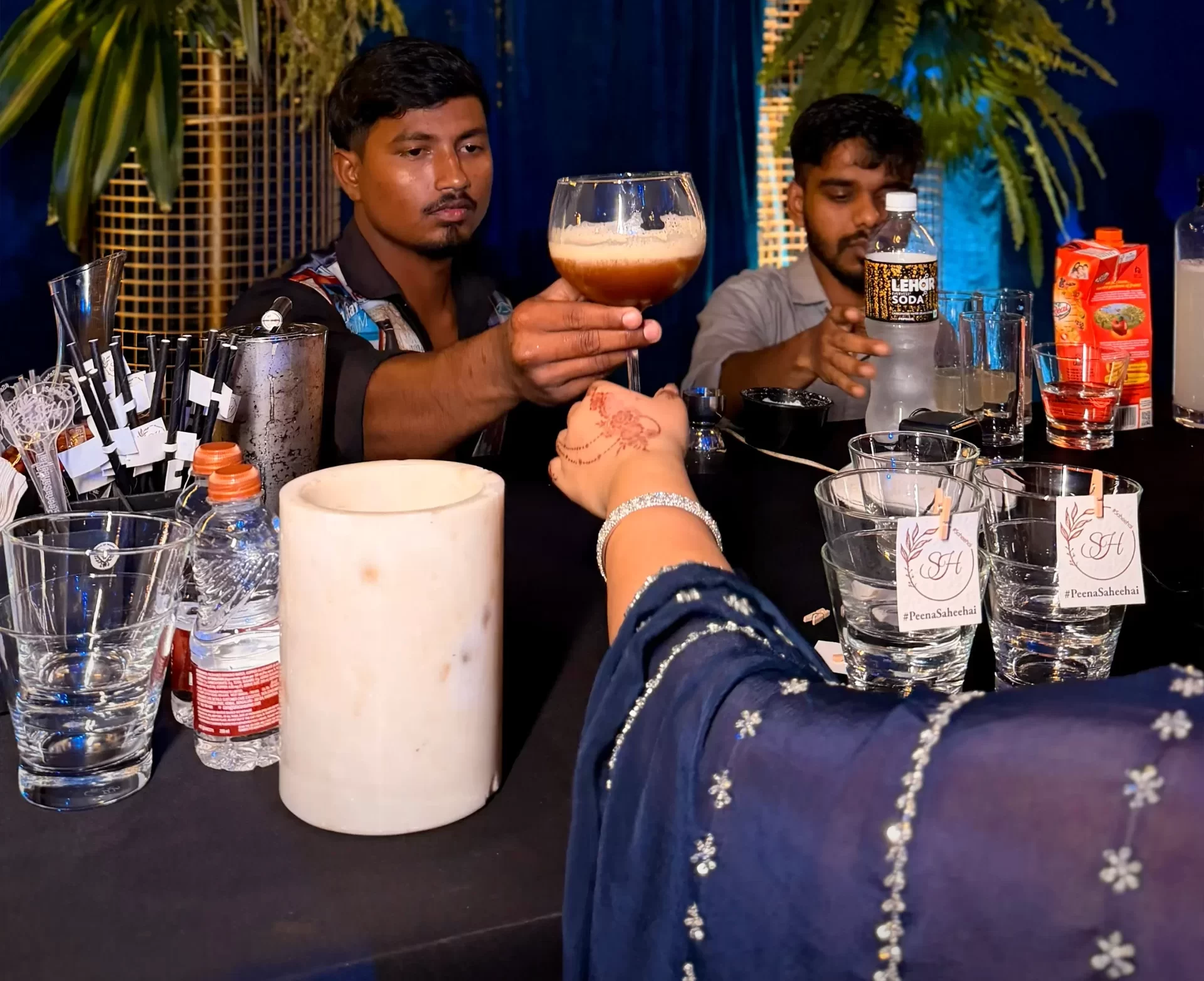 Guests enjoying complete wedding bar experience during reception